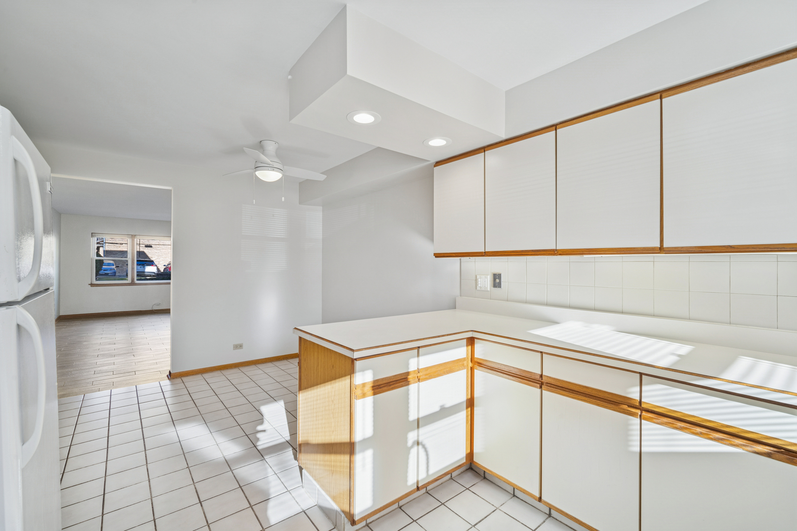 6800 North Overhill Avenue, Unit 1A Chicago, IL 60631 - Photo 9 of 20 a kitchen with stainless steel appliances granite countertop a sink and cabinets