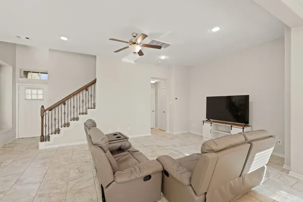 a view of a livingroom with furniture