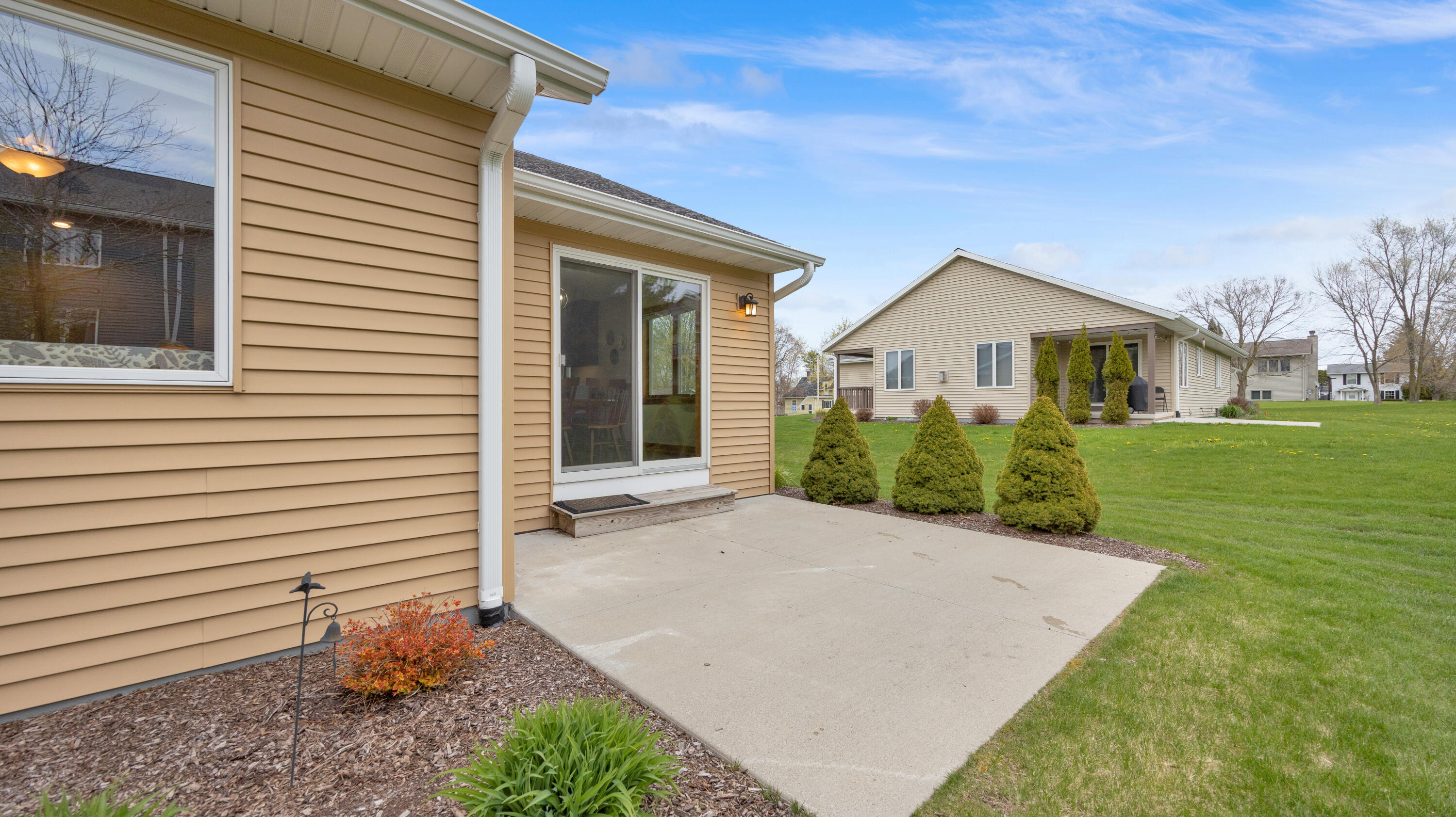 4033 Spring Court Sheboygan, WI 53081 - Photo 6 of 24 Backyard Patio