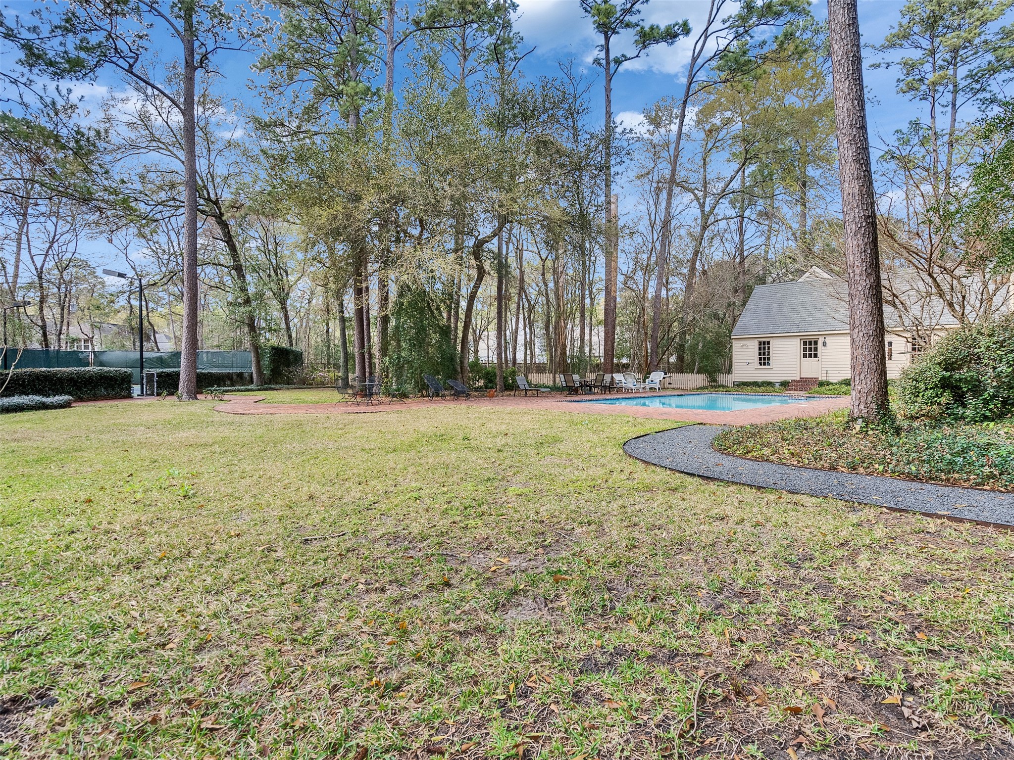 5212 Strack Road Houston, TX 77069 - Photo 39 of 42 Just minutes from championship golf courses and high-end shopping, this property offers a rare opportunity to enjoy a peaceful, wooded retreat without sacrificing access to the city.
