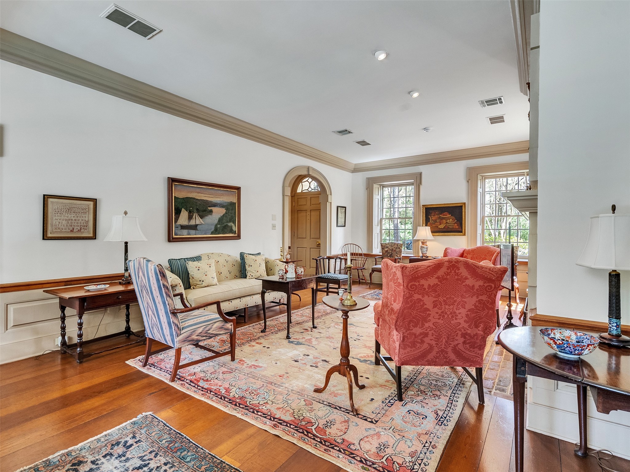 5212 Strack Road Houston, TX 77069 - Photo 4 of 42 Perfect for hosting or quiet evenings, this light filled family room offers timeless charm.
