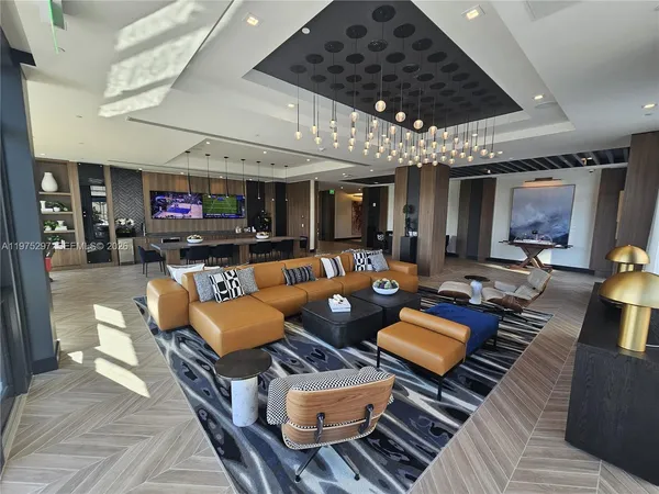 a living room with furniture and a table