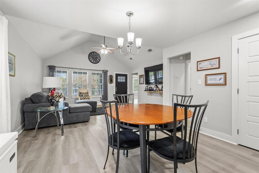 608 East Shepherd Street Denison, TX 75021 - Photo 11 of 31 a view of a dining room with furniture window and wooden floor
