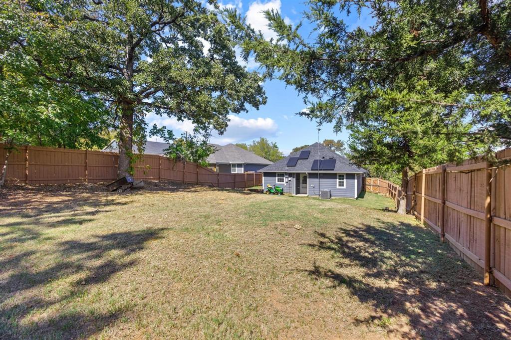 608 East Shepherd Street Denison, TX 75021 - Photo 29 of 31 a house view with a outdoor space