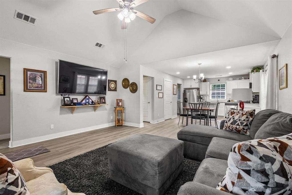 608 East Shepherd Street Denison, TX 75021 - Photo 7 of 31 a living room with furniture and a flat screen tv