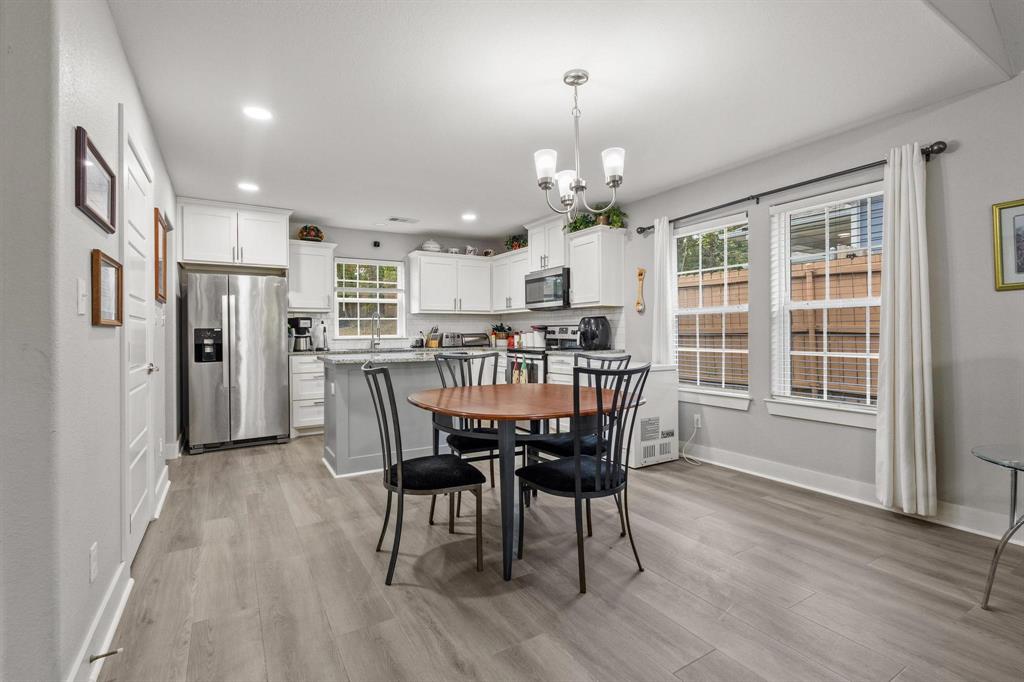 608 East Shepherd Street Denison, TX 75021 - Photo 10 of 31 a view of a dining room with furniture window and wooden floor