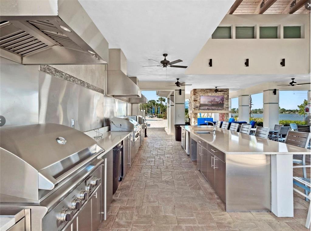 2665 Meadowedge Loop St. Cloud, FL 34772 - Photo 51 of 53 a kitchen with stainless steel appliances lots of counter top space