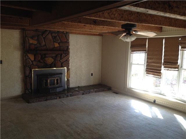 365 Academy Road Lebanon, TN 37087 - Photo 5 of 9 a view of empty room with a fireplace