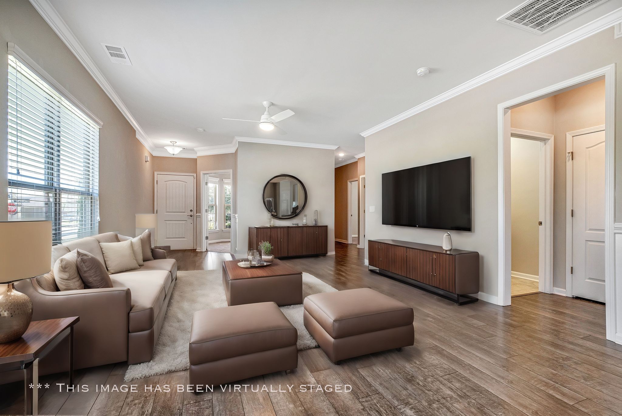 104 Tipton Pass Spring Hill, TN 37174 - Photo 11 of 57 a living room with furniture and a flat screen tv
