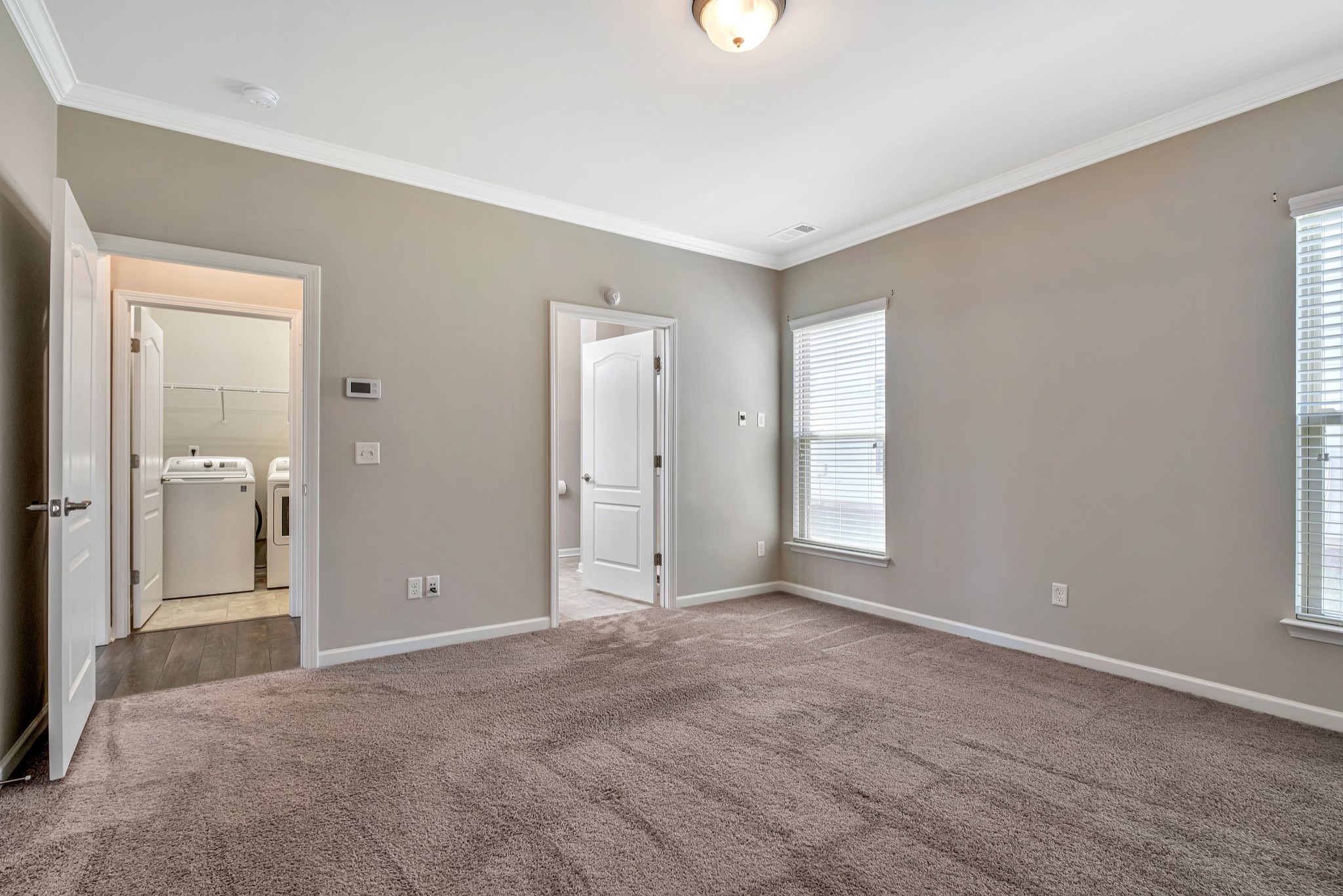 104 Tipton Pass Spring Hill, TN 37174 - Photo 24 of 57 a view of an empty room with window and bathroom