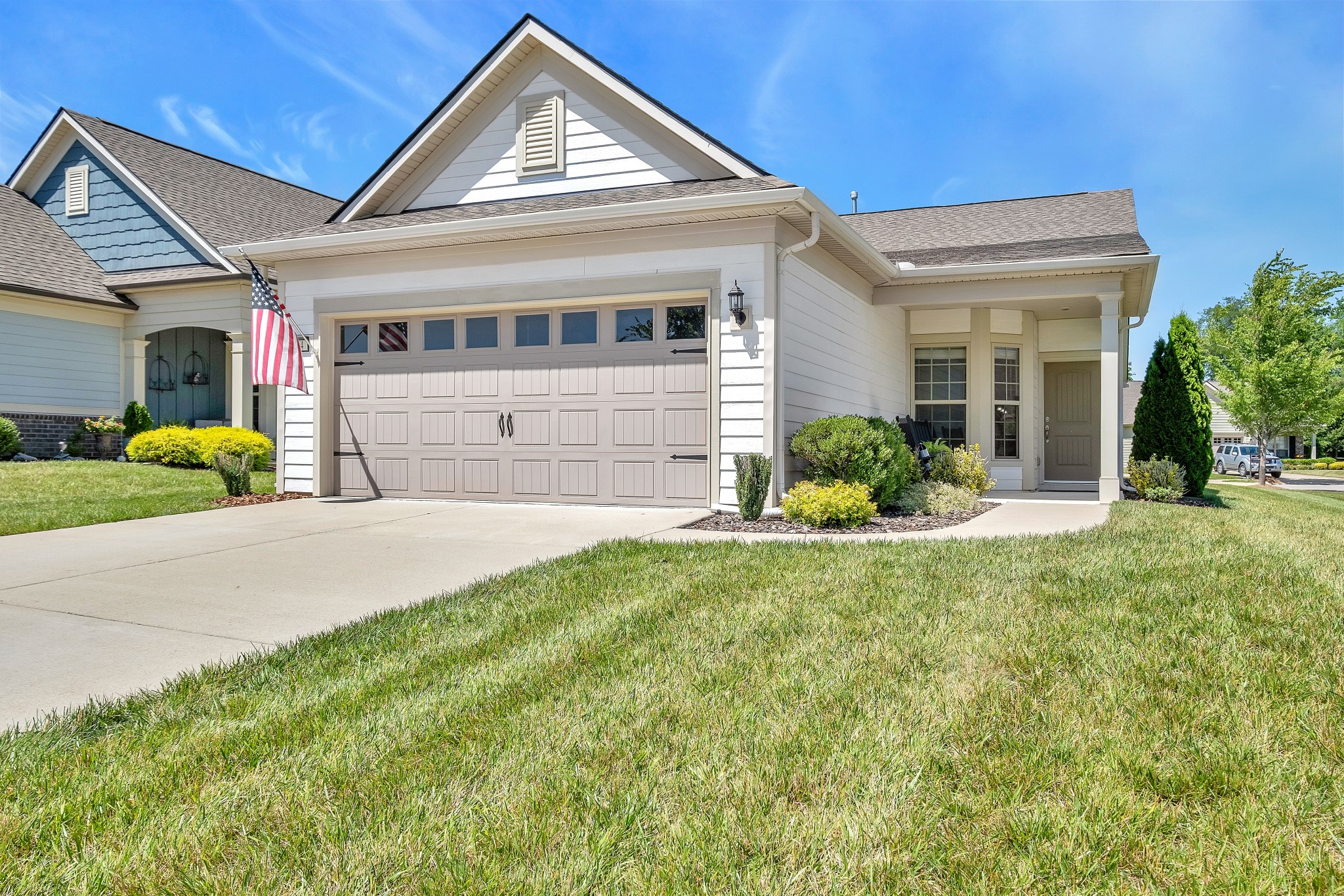 104 Tipton Pass Spring Hill, TN 37174 - Photo 3 of 57 front view of a house with a yard