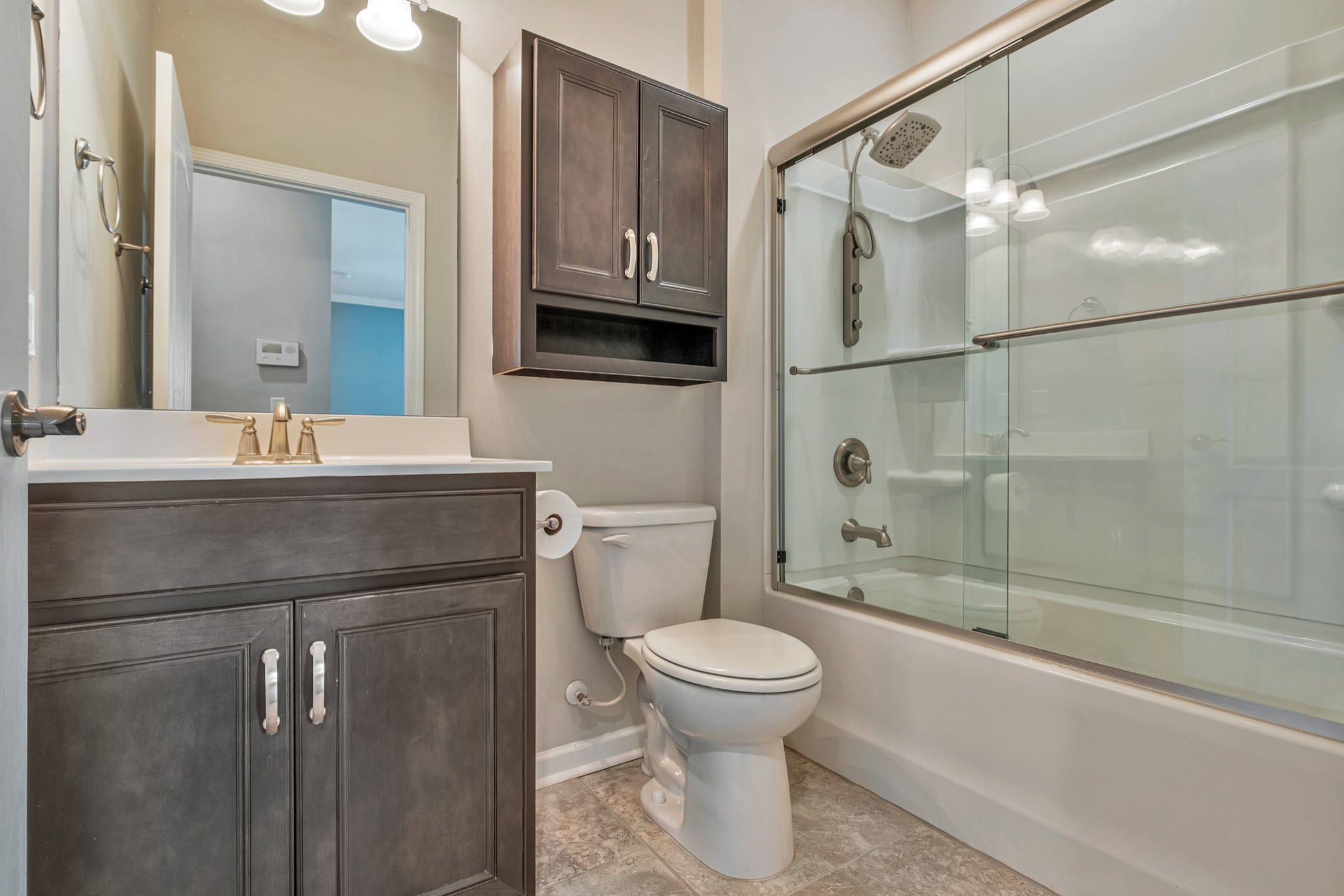 104 Tipton Pass Spring Hill, TN 37174 - Photo 31 of 57 a bathroom with a sink toilet and shower