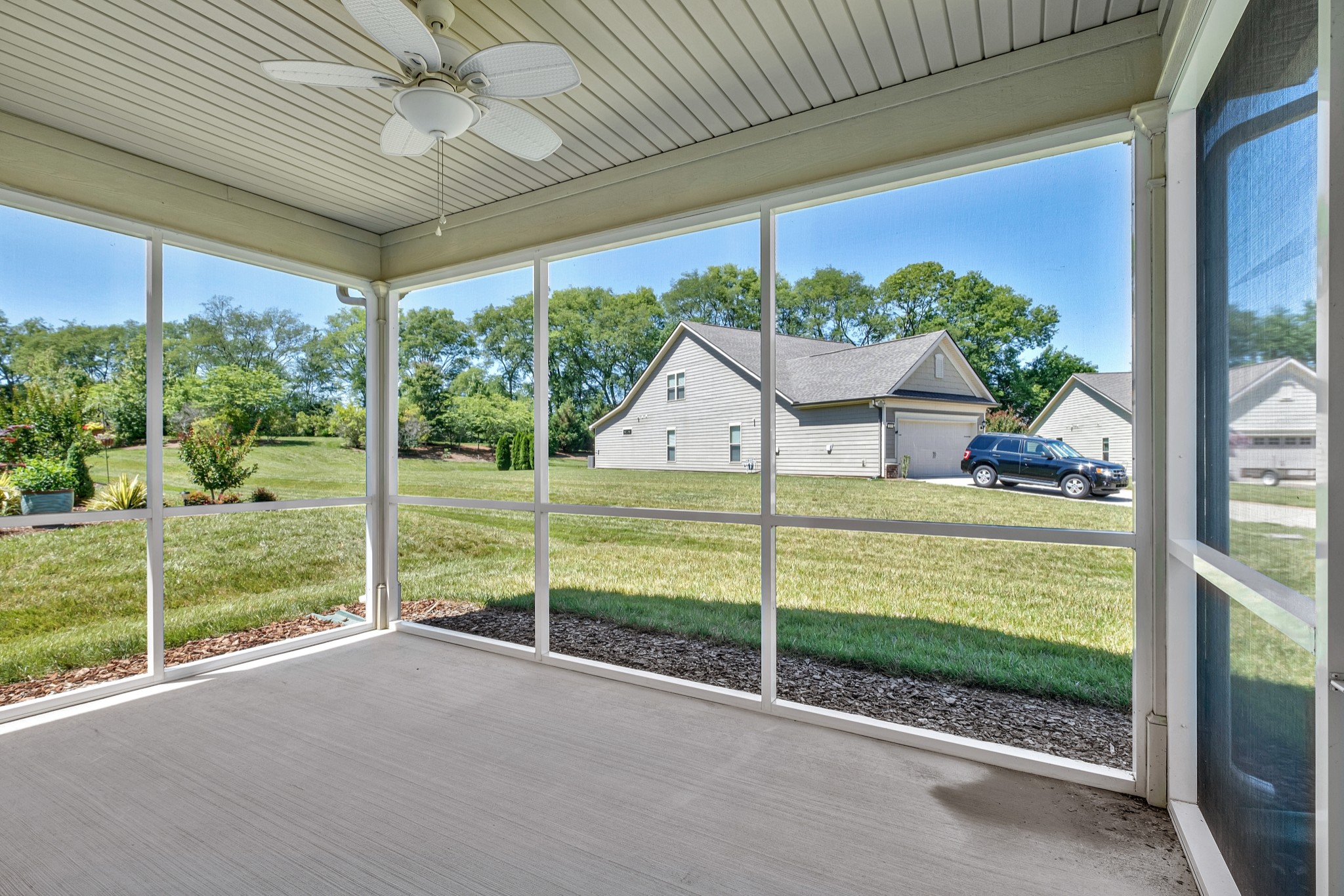 104 Tipton Pass Spring Hill, TN 37174 - Photo 38 of 57 a view of a porch with furniture and garden