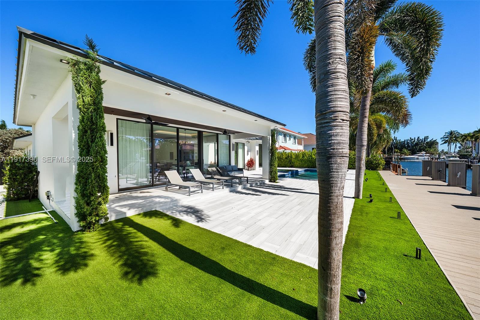 900 Washington Street Hollywood, FL 33019 - Photo 40 of 61 a view of swimming pool with a patio