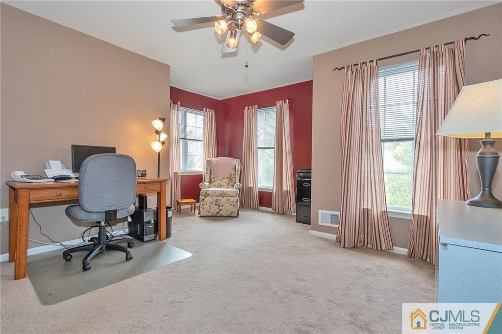 15 Crescent Road Old Bridge, NJ 08857 - Photo 11 of 19 a view of a workspace with furniture and a window
