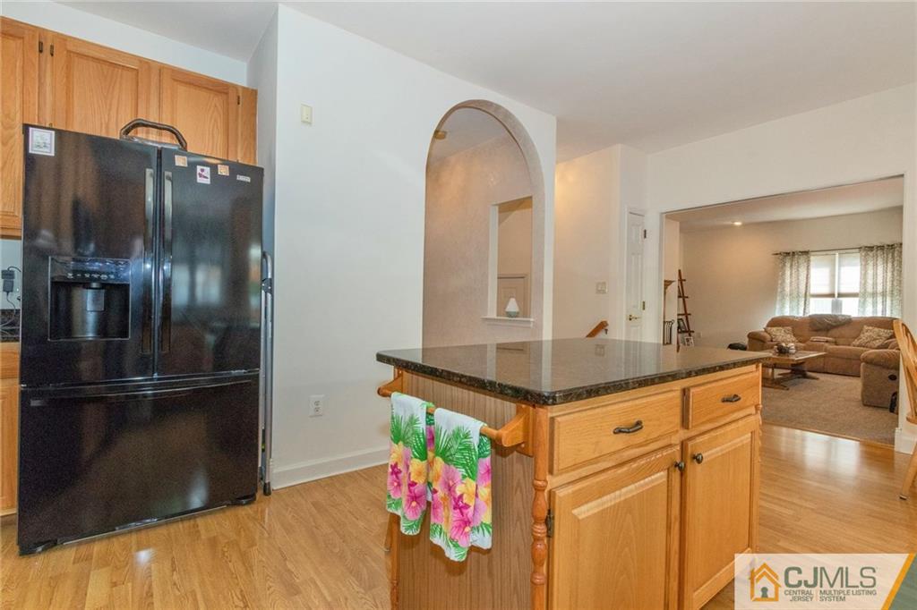 15 Crescent Road Old Bridge, NJ 08857 - Photo 6 of 19 a kitchen with stainless steel appliances granite countertop a refrigerator and a sink