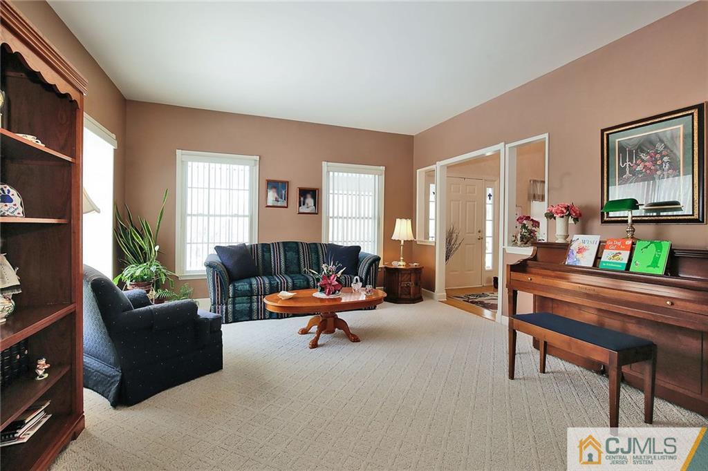 15 Crescent Road Old Bridge, NJ 08857 - Photo 7 of 19 a living room with furniture and a window