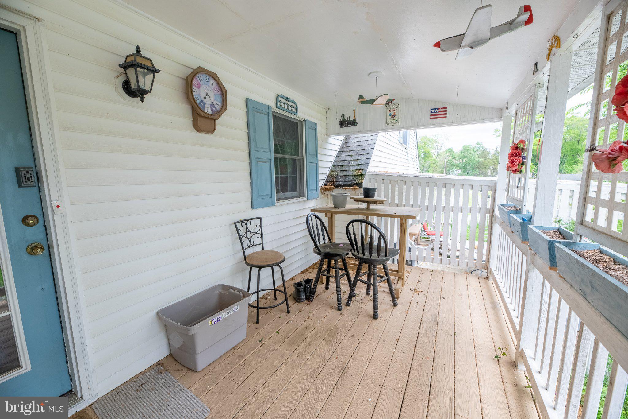 57 Diverty Road Pennington, NJ 08534 - Photo 64 of 86 Charming porch with playful decor.