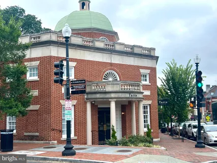a picture of a bench in a white building