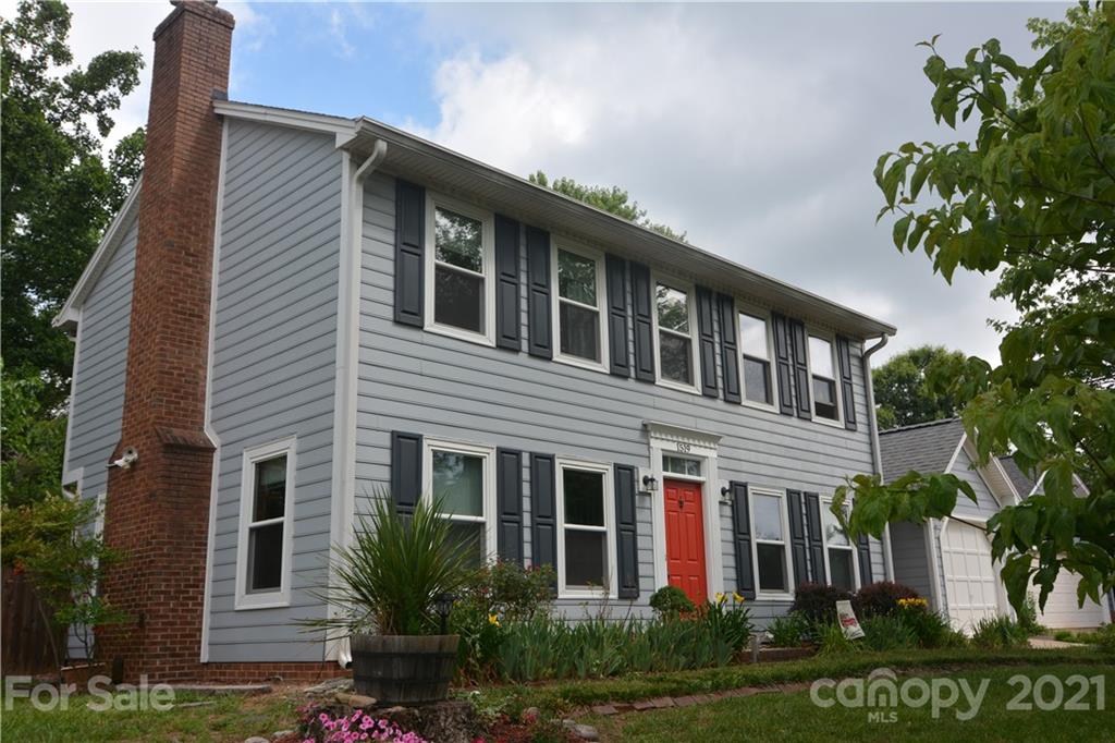 1519 Pine Mountain Road Charlotte, NC 28214 - Photo 2 of 11 a front view of a house with a yard