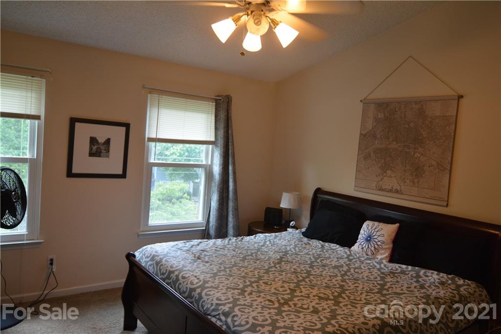 1519 Pine Mountain Road Charlotte, NC 28214 - Photo 7 of 11 a bedroom with a bed and a window