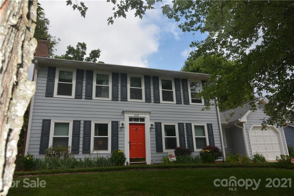 1519 Pine Mountain Road Charlotte, NC 28214 - Photo 10 of 11 a view of a house with a yard