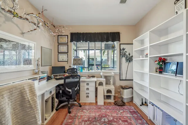 a view of a kitchen with appliances and cabinets