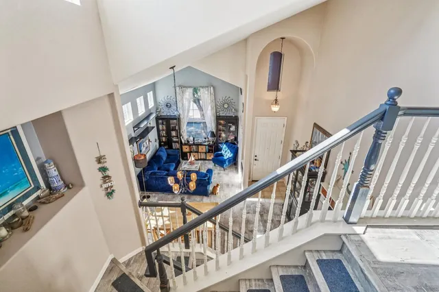 a view of an entryway with wooden floor