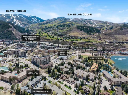 an aerial view of a city with lots of residential buildings