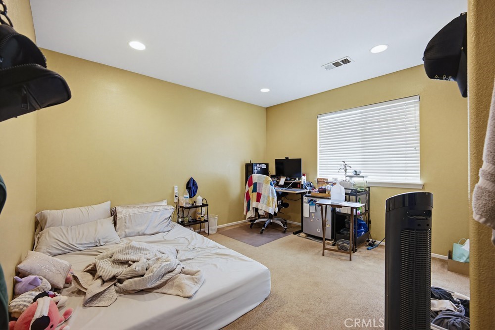 1747 Palermo Drive Riverside, CA 92507 - Photo 19 of 30 a room with furniture and a window