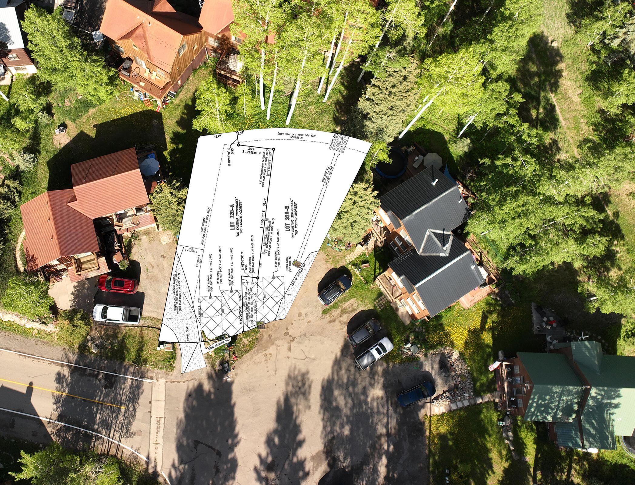176 Alexander Overlook Telluride, CO 81435 - Photo 7 of 19 an aerial view of a house with a yard and garden