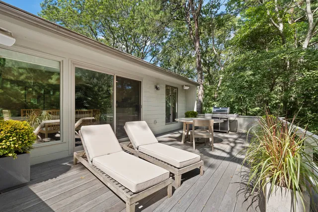 a view of a patio on the roof deck