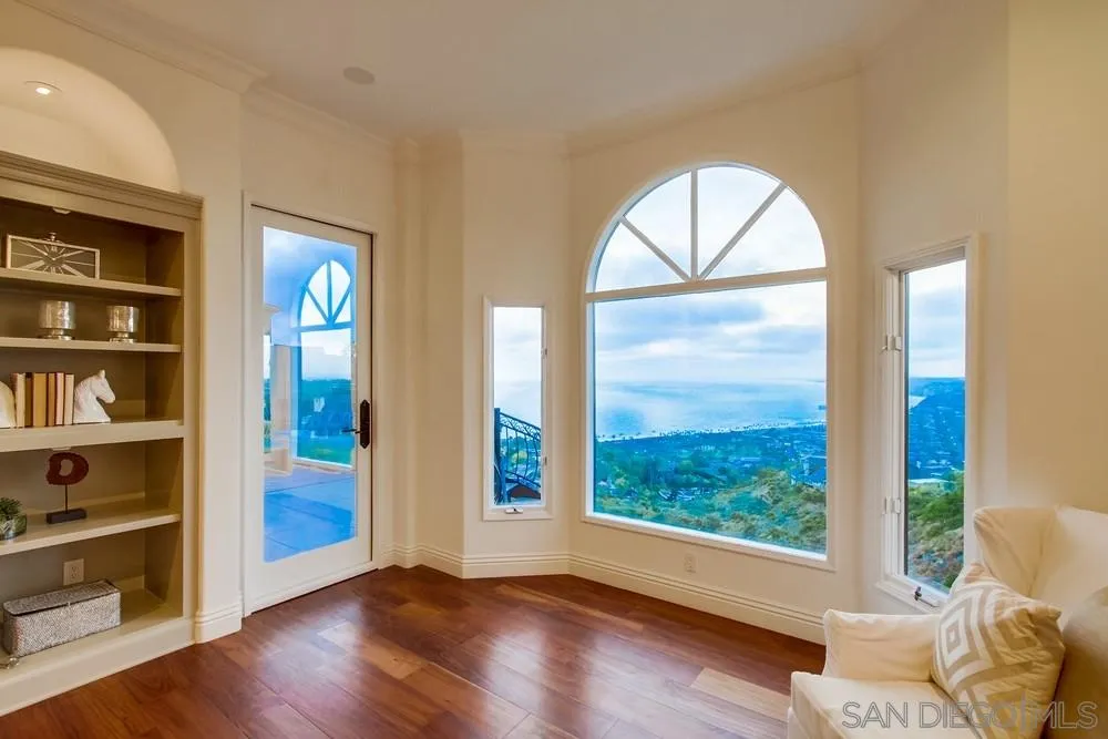 7411 Hillside Drive La Jolla, CA 92037 - Photo 18 of 25 a view of livingroom with furniture and window