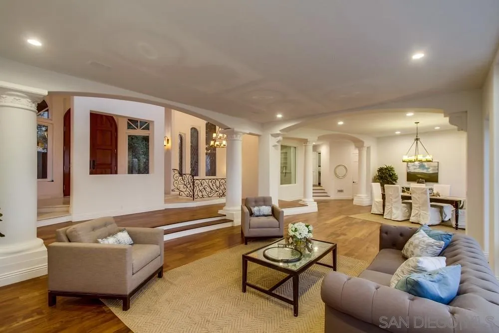 7411 Hillside Drive La Jolla, CA 92037 - Photo 5 of 25 a living room with furniture and a large window