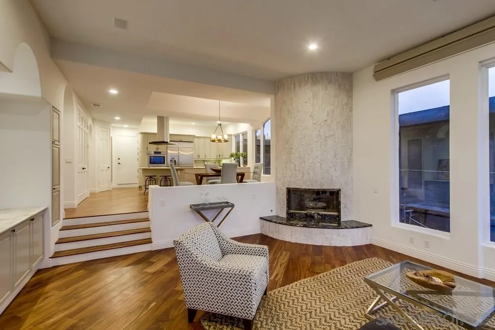 7411 Hillside Drive La Jolla, CA 92037 - Photo 9 of 25 a living room with furniture and a fireplace