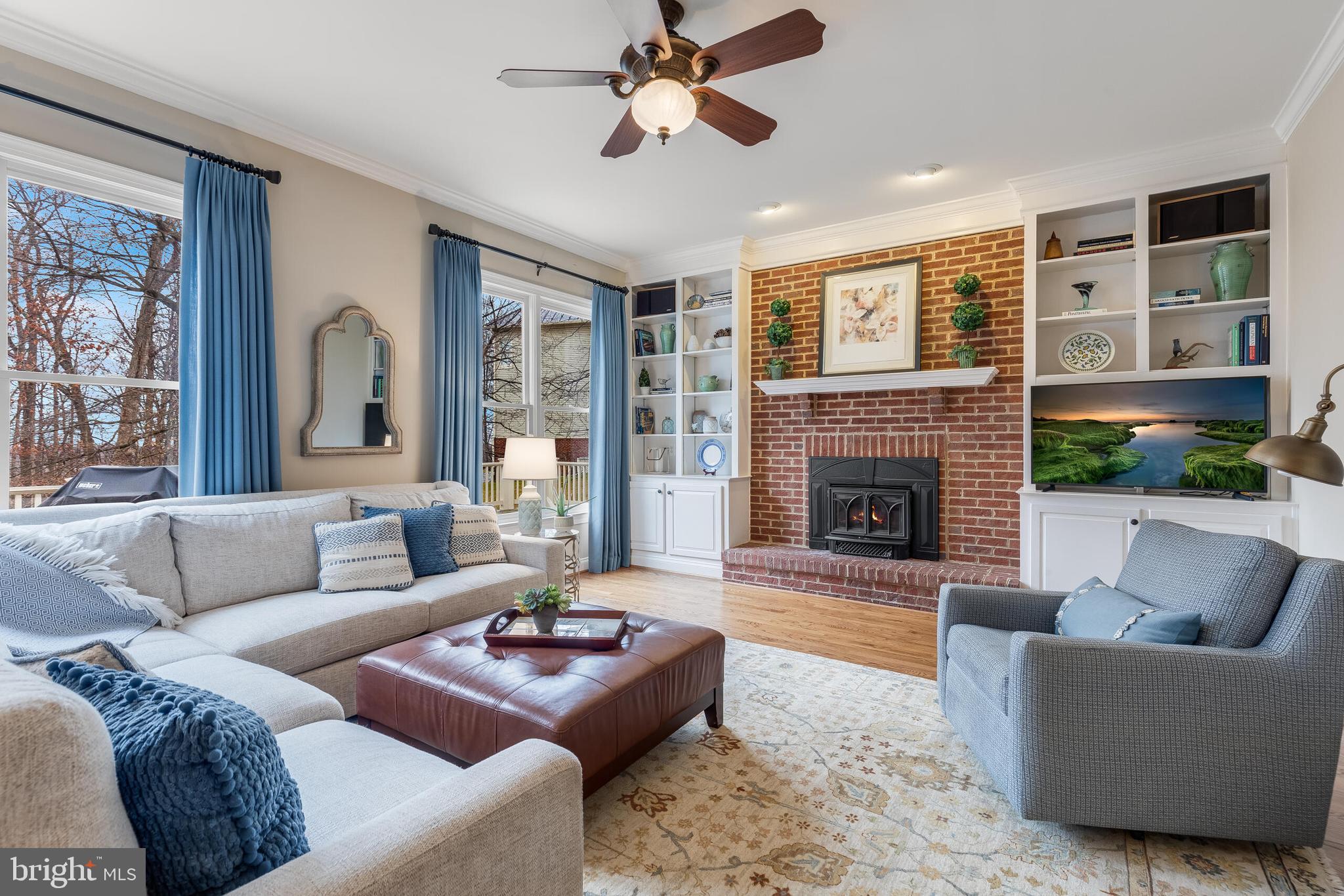 1181 Hawling Place Southwest Leesburg, VA 20175 - Photo 14 of 66 a living room with furniture and a fireplace