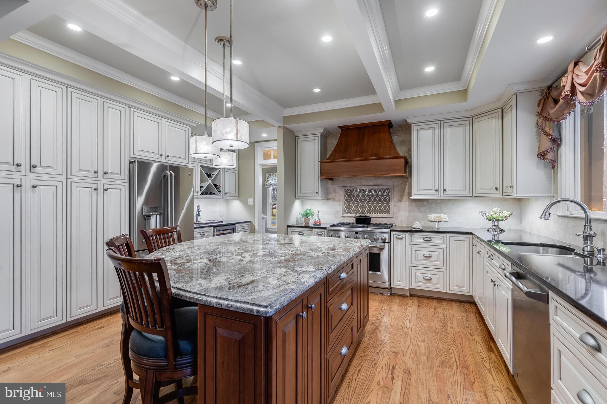 1181 Hawling Place Southwest Leesburg, VA 20175 - Photo 8 of 66 a kitchen with cabinets appliances and a counter top space