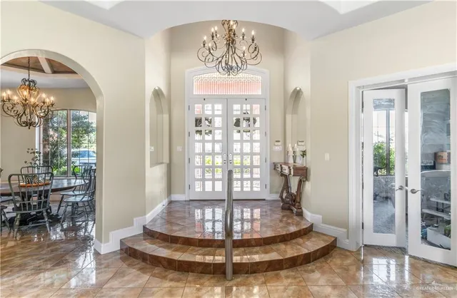 a view of a livingroom with furniture and windows