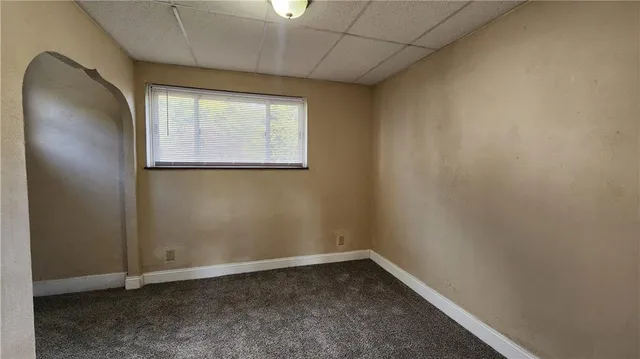 a view of a room that has a window