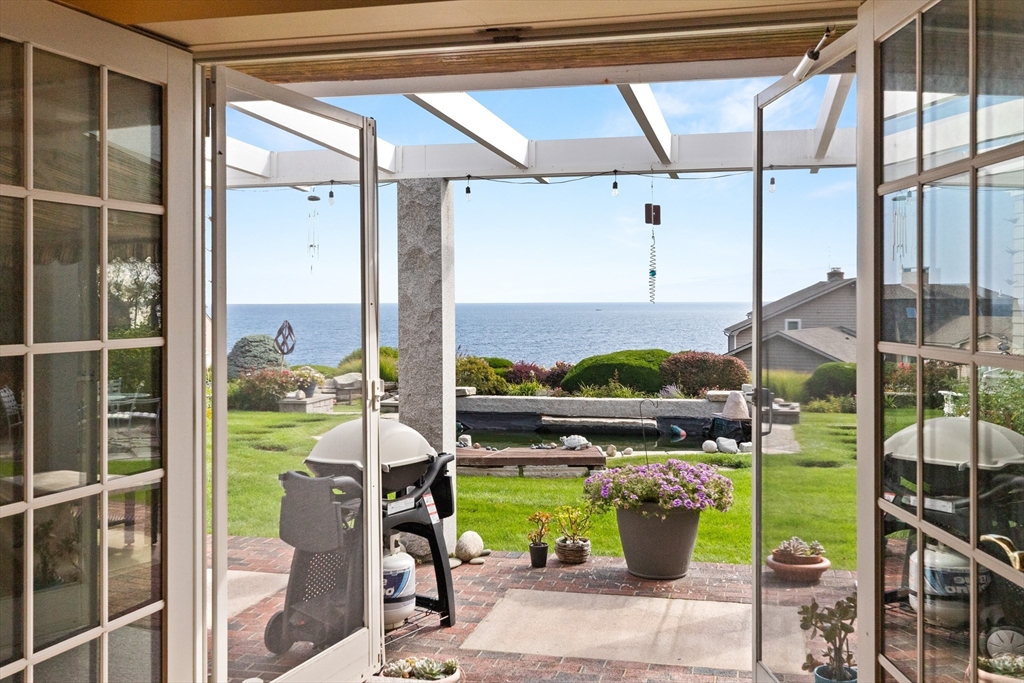 13 Phillips Avenue Rockport, MA 01966 - Photo 12 of 39 a view of a city from a porch