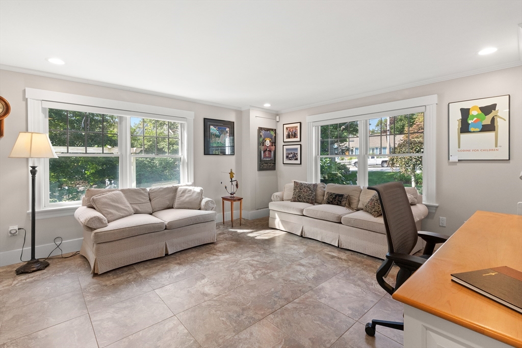 13 Phillips Avenue Rockport, MA 01966 - Photo 15 of 39 a living room with furniture and a large window