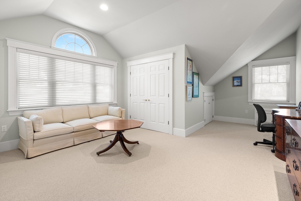 13 Phillips Avenue Rockport, MA 01966 - Photo 29 of 39 a living room with furniture and a window