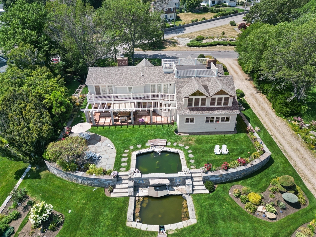13 Phillips Avenue Rockport, MA 01966 - Photo 4 of 39 a aerial view of a chairs and table in patio
