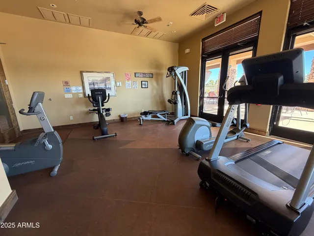 a view of a room with gym equipment