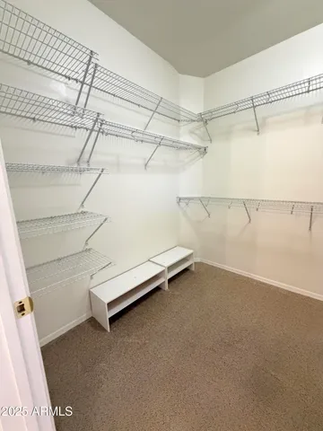 a view of a room with racks on the wall