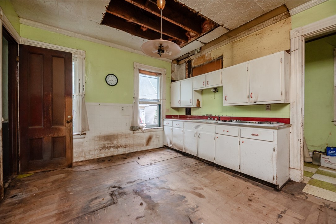 82 Harper Street Rochester, NY 14607 - Photo 12 of 46 Remodel this spacious kitchen back to its formal g