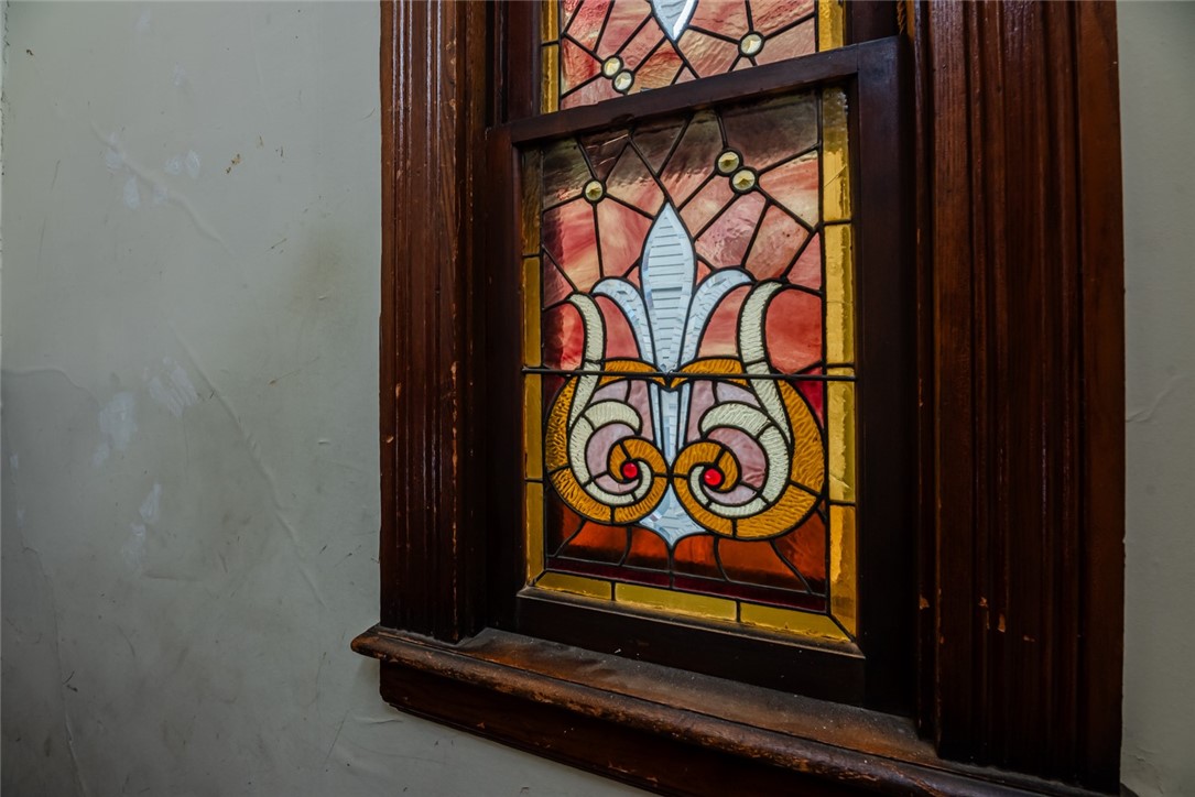 82 Harper Street Rochester, NY 14607 - Photo 30 of 46 Stunning stained glass window remains intact.