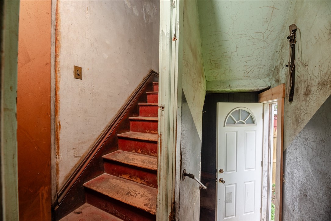 82 Harper Street Rochester, NY 14607 - Photo 40 of 46 2nd staircase back of the house.