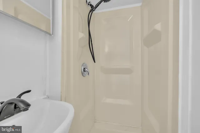 a bathroom with a white bath tub