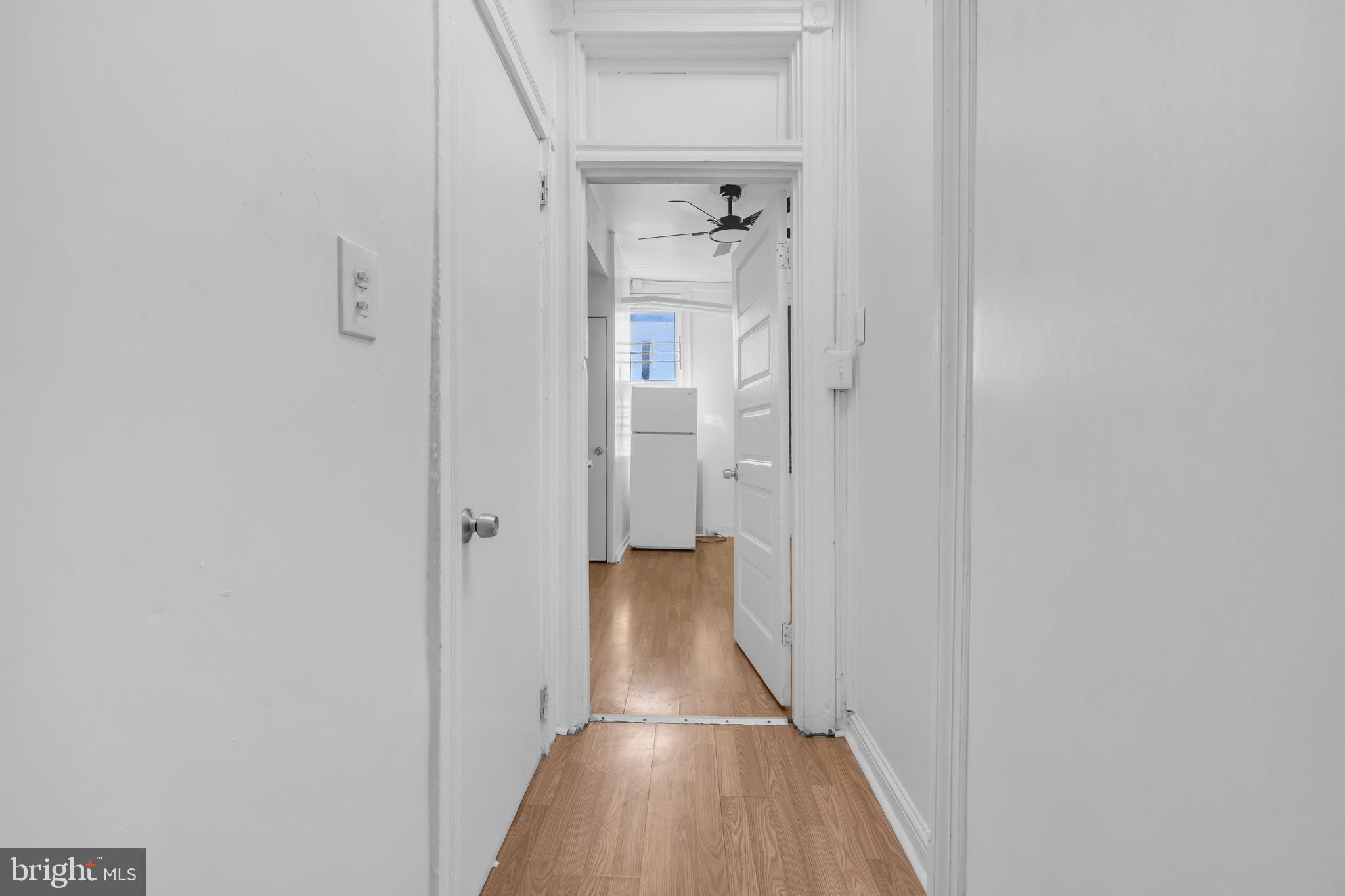 2920 Parkwood Avenue, Unit 3 Baltimore, MD 21217 - Photo 9 of 12 a view of a hallway with wooden floor